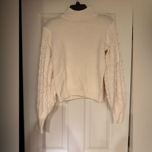 Gianni Bini Women’s Cream Mock Neck Sweater with Textured Puff Sleeves